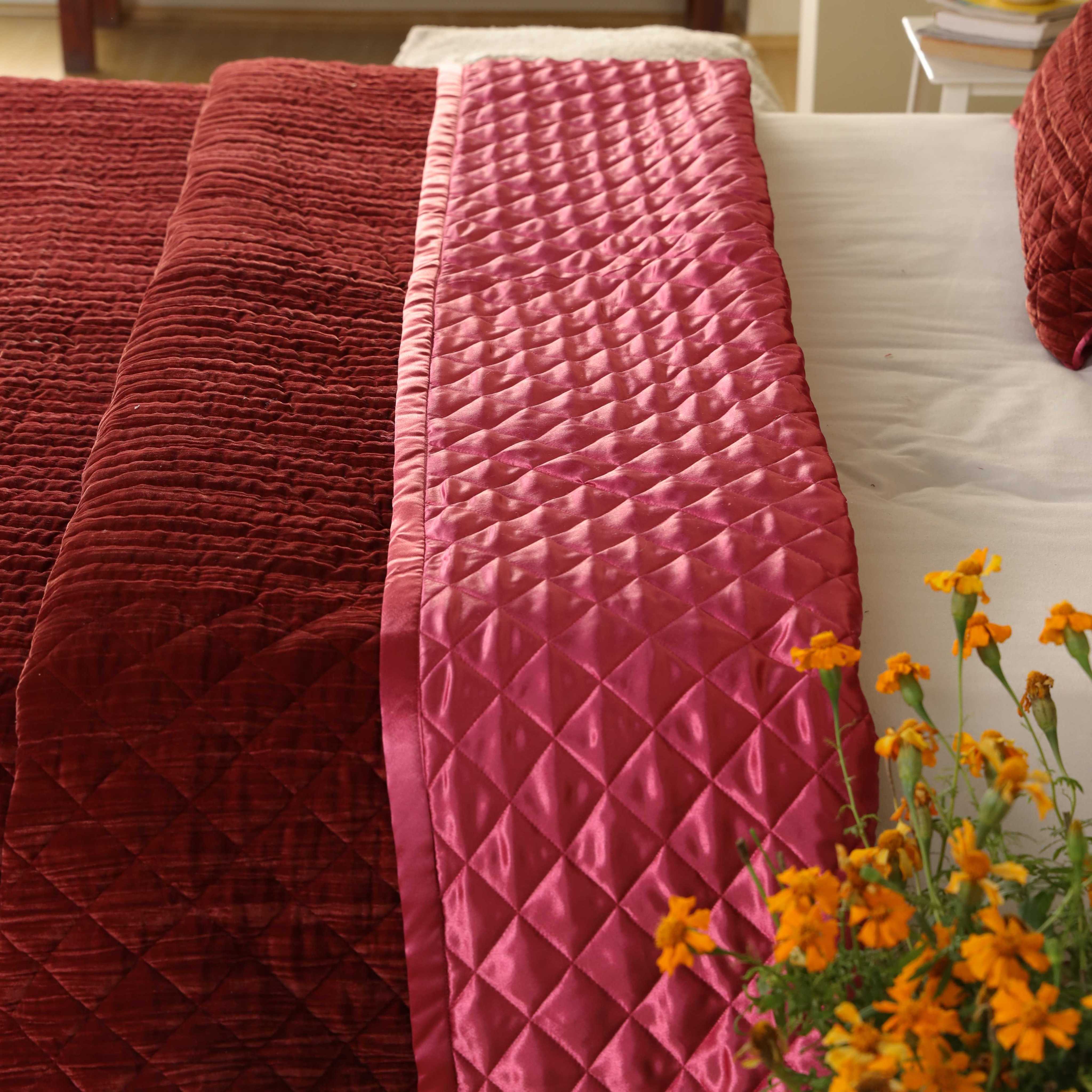 Luxury luxury bedding featuring the contrast between shiny satin and matte velvet textures.