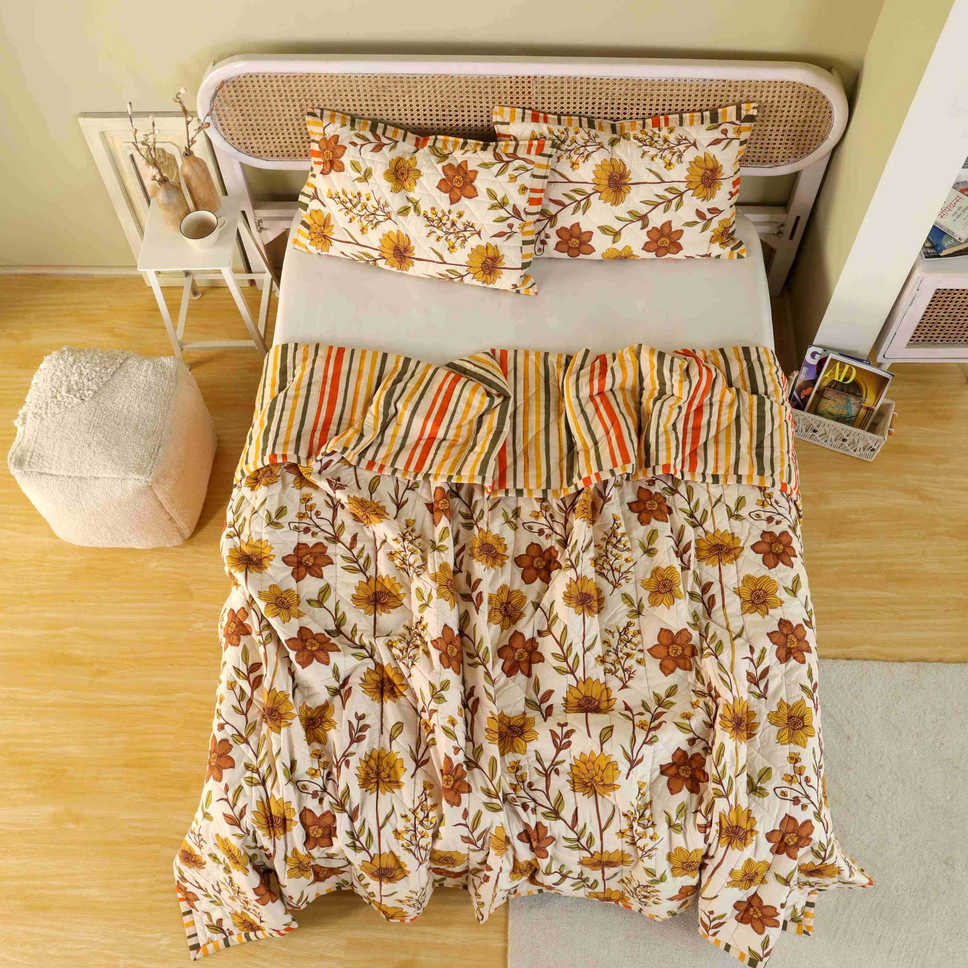 Neutral bedroom decor featuring a beige floral cotton quilt set.