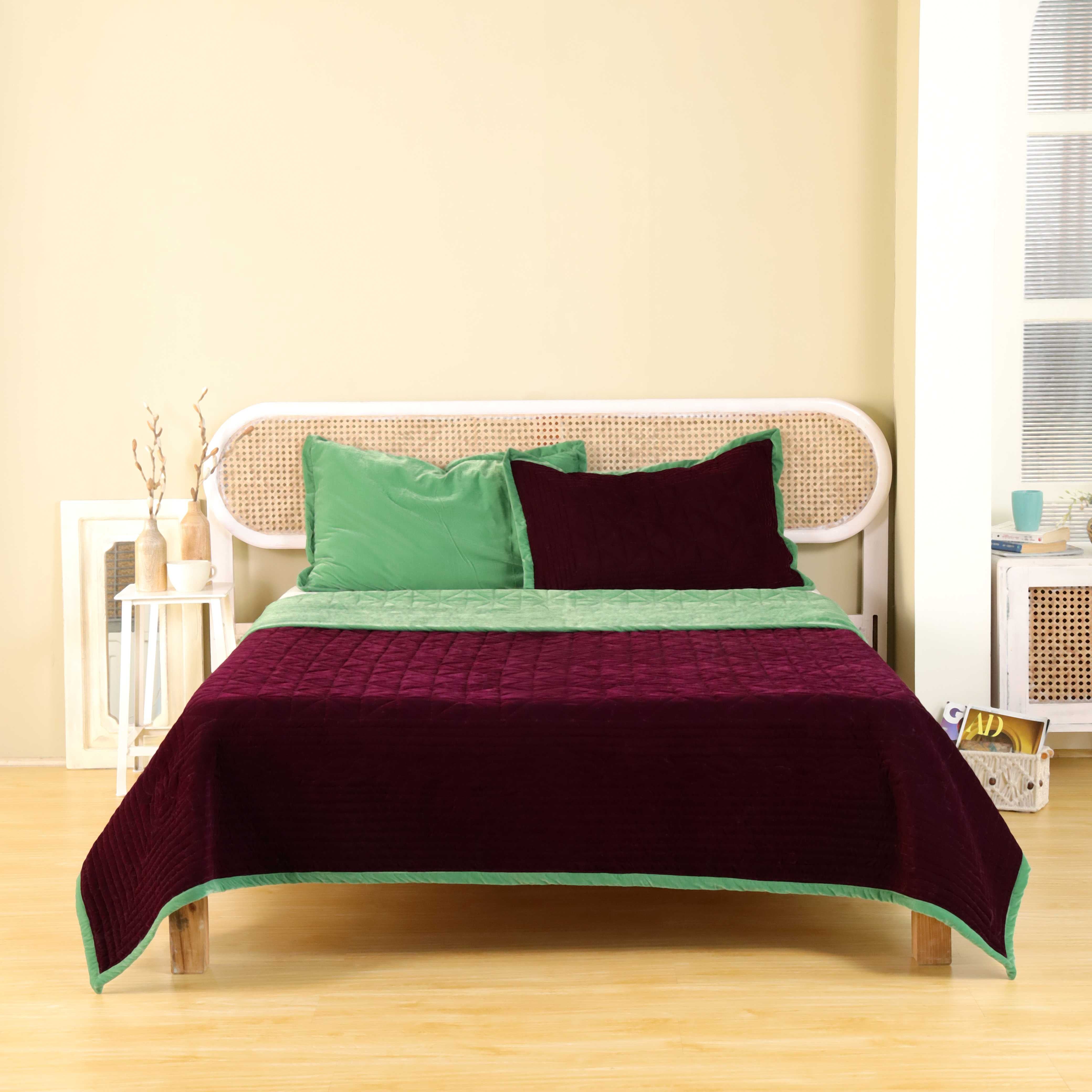 Reversible duvet cover with faded maroon velvet on top and sage green satin underneath.